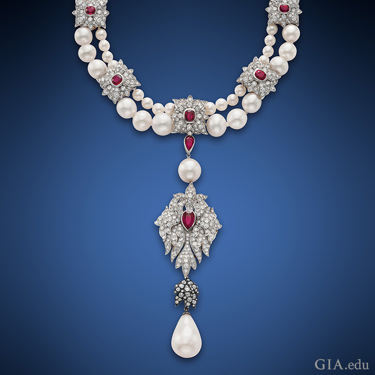 Elizabeth Taylor’s historic 50.56 carat La Peregrina Pearl prominently features the June birthstone in a pendant to a two-strand pearl, ruby, and diamond necklace. Elizabeth Taylor’s historic 50.56 carat La Peregrina Pearl prominently features the June birthstone in a pendant to a two-strand pearl, ruby, and diamond necklace.