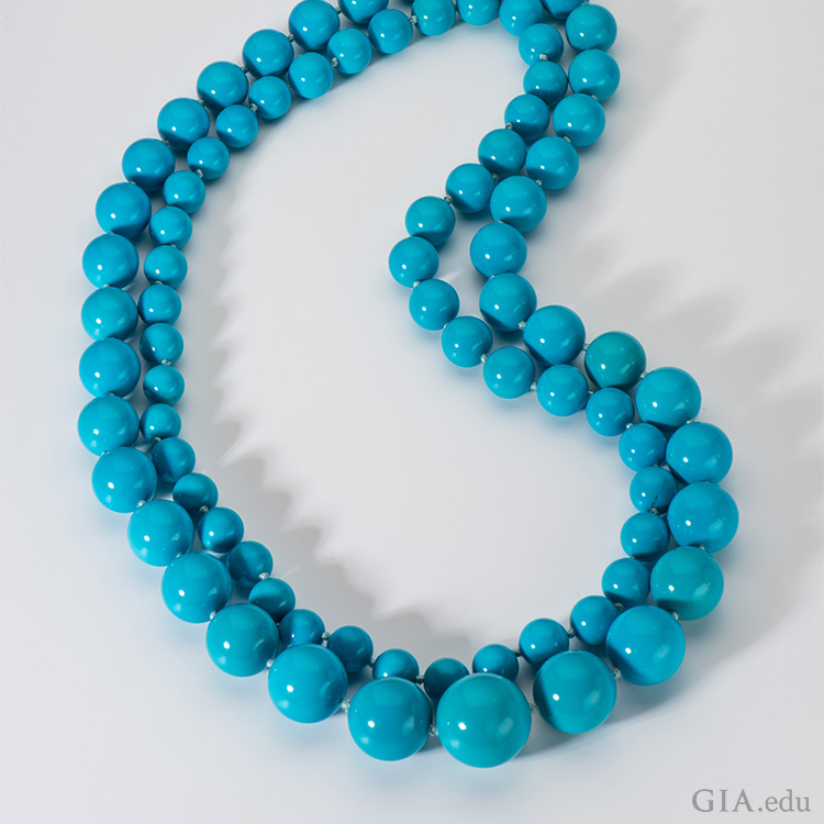 A double-strand necklace with intense turquoise beads flaunts the December birthstone from Arizona’s Sleeping Beauty mine. A double-strand necklace with intense turquoise beads flaunts the December birthstone from Arizona’s Sleeping Beauty mine.