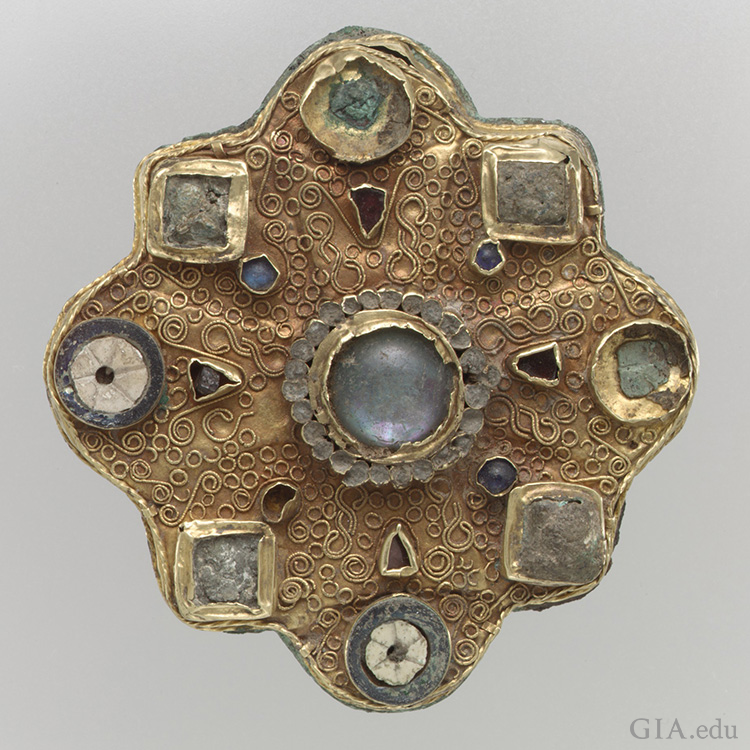 The June birthstone is featured in a Frankish disk brooch from the second half 7th century made of gold sheet, filigree, moonstone, glass cabochons, garnets, mother-of-pearl, and moonstone. The June birthstone is featured in a Frankish disk brooch from the second half 7th century made of gold sheet, filigree, moonstone, glass cabochons, garnets, mother-of-pearl, and moonstone.