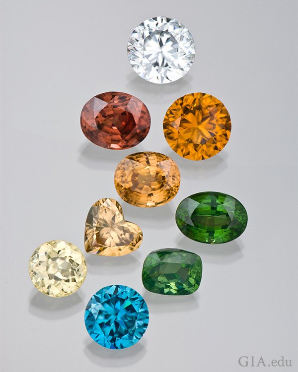 The December birthstone zircon is displayed in an array of colors of blue, green, yellow, orange, red, and clear. The December birthstone zircon is displayed in an array of colors of blue, green, yellow, orange, red, and clear.